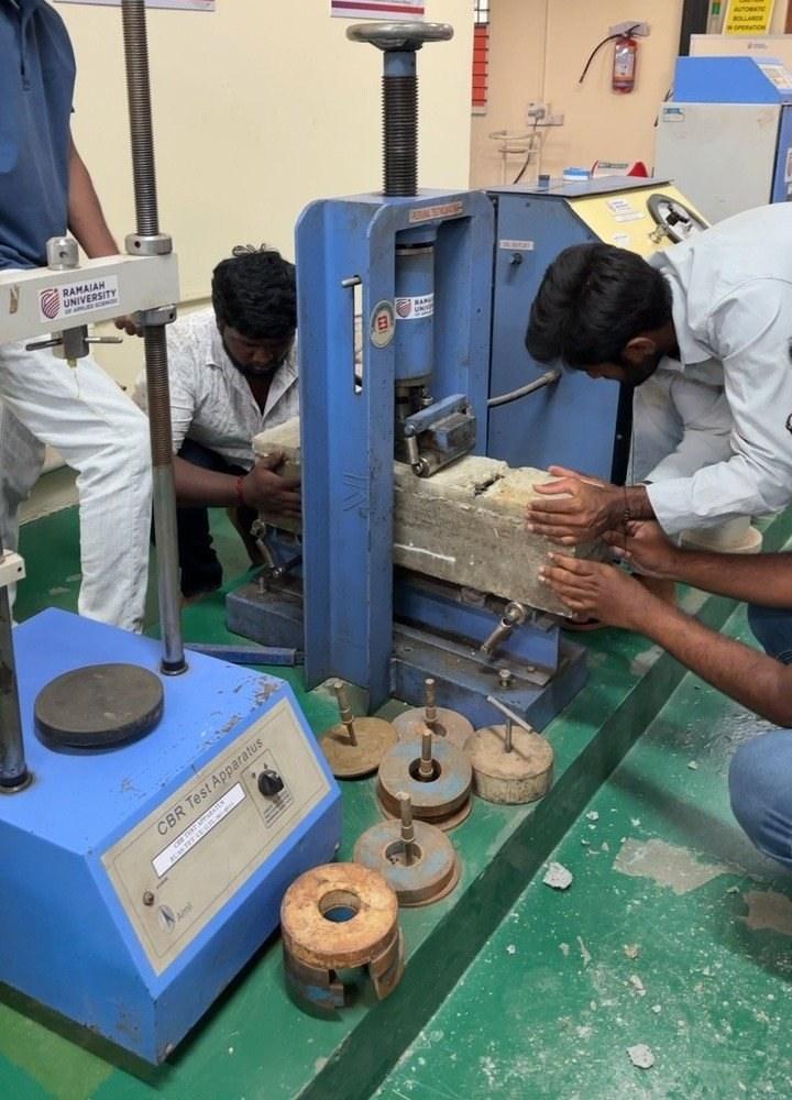 Flexural strength test of GridMats samples on a testing machine at MSRIT